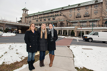 Tracie with her mother and Ashley in front of the Hotel Hershey