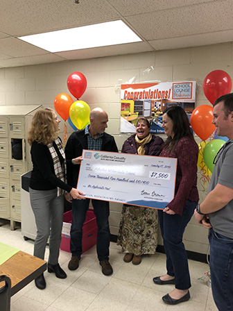California Casualty presenting the check