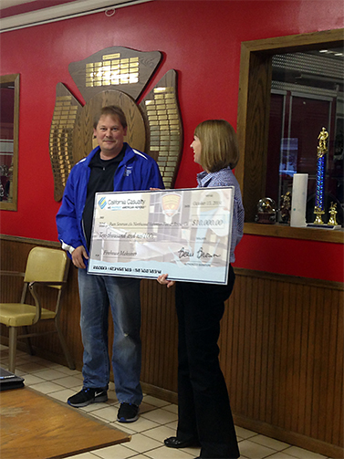 Winner Ryan Severson with California Casualty Field Representative Rebecca Stumpf