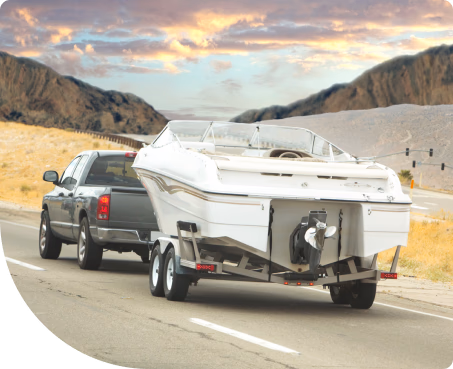 truck pulling boat on trailer