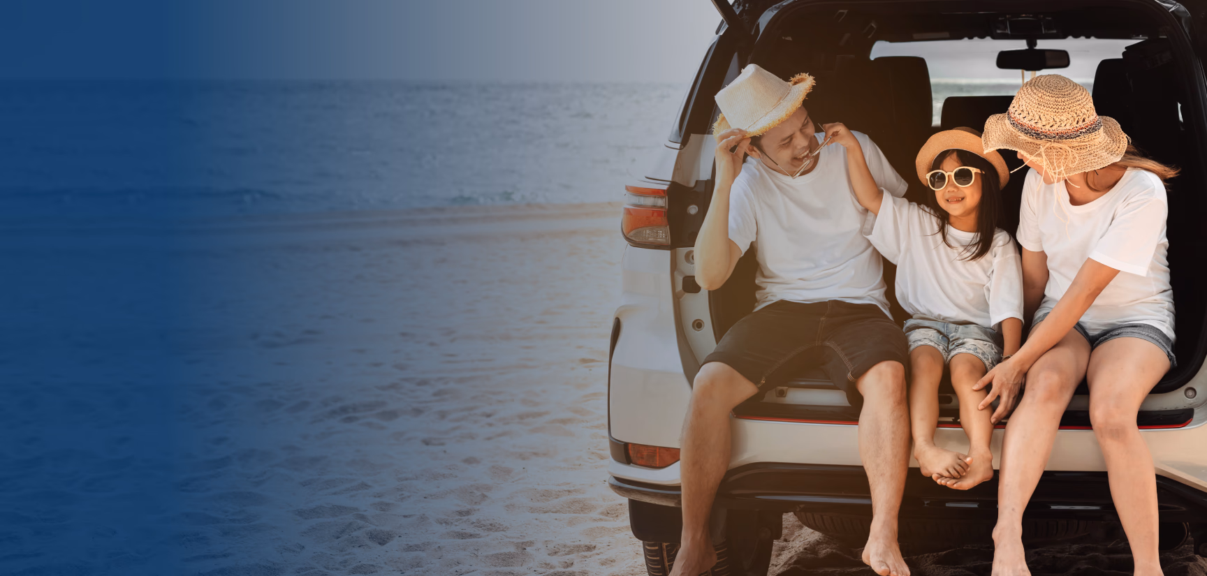 Family enjoying time in the back of their car in Mexico