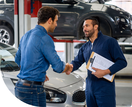 auto mechanic with customer