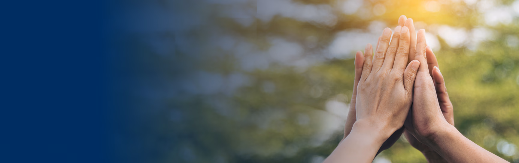 Hands High-fiving showing community support