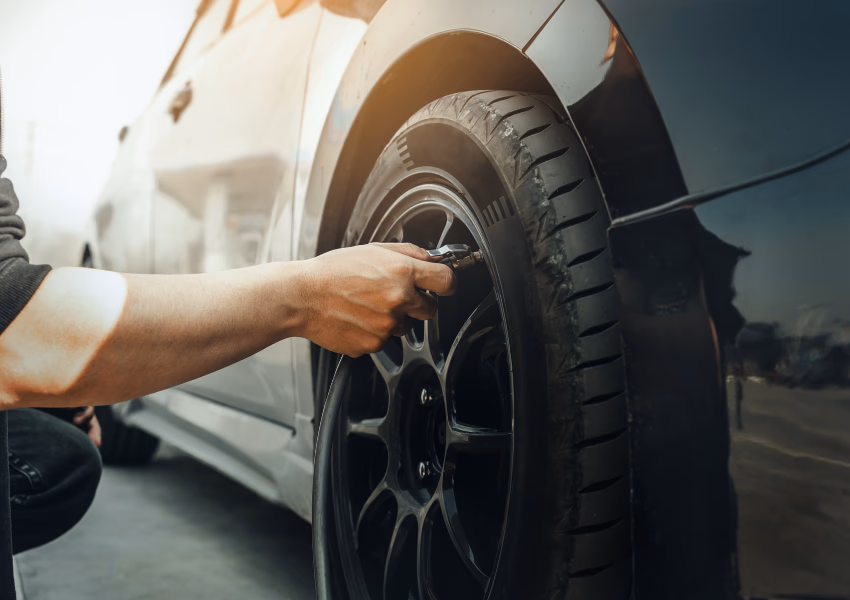 inflating tire on vehicle