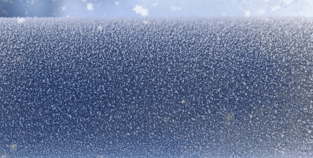 close up of ice crystals on pipe