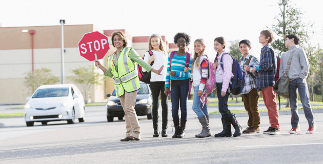 crossing guard with students
