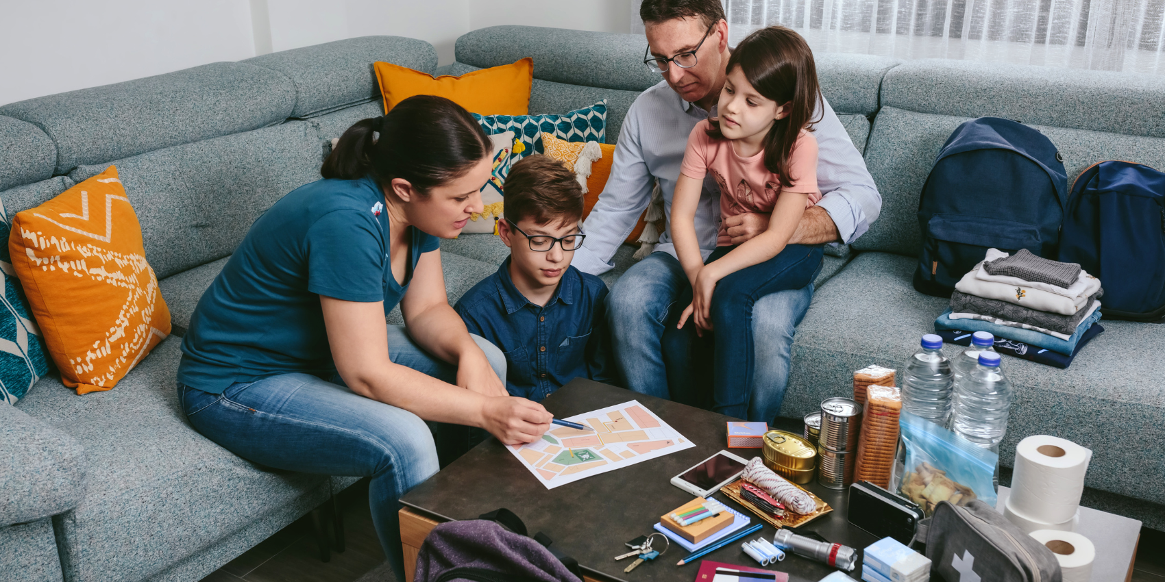 family sitting creating family emergency plan